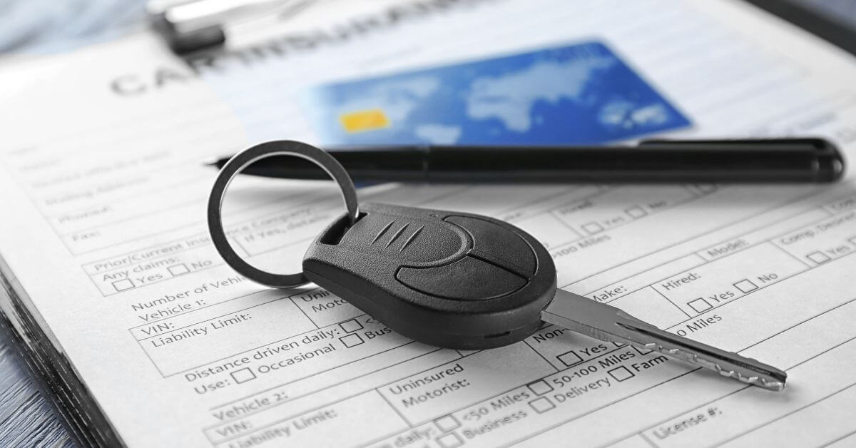 auto refinance low credit score - car keys, credit card, credit scores, and auto loan application